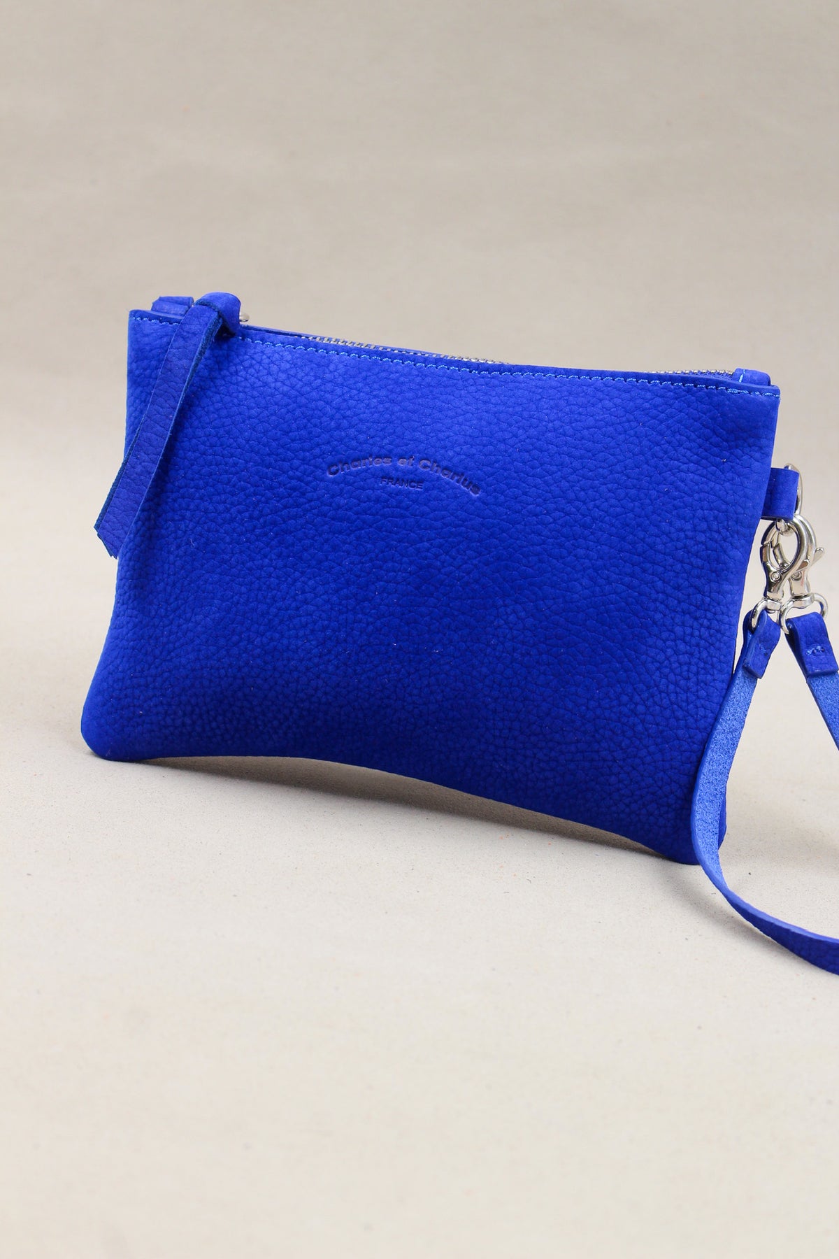 Trousse bleu en cuir nubuck taurillon