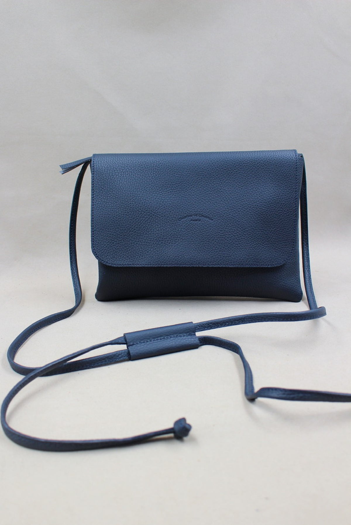 Pochette bandoulière réglable en cuir