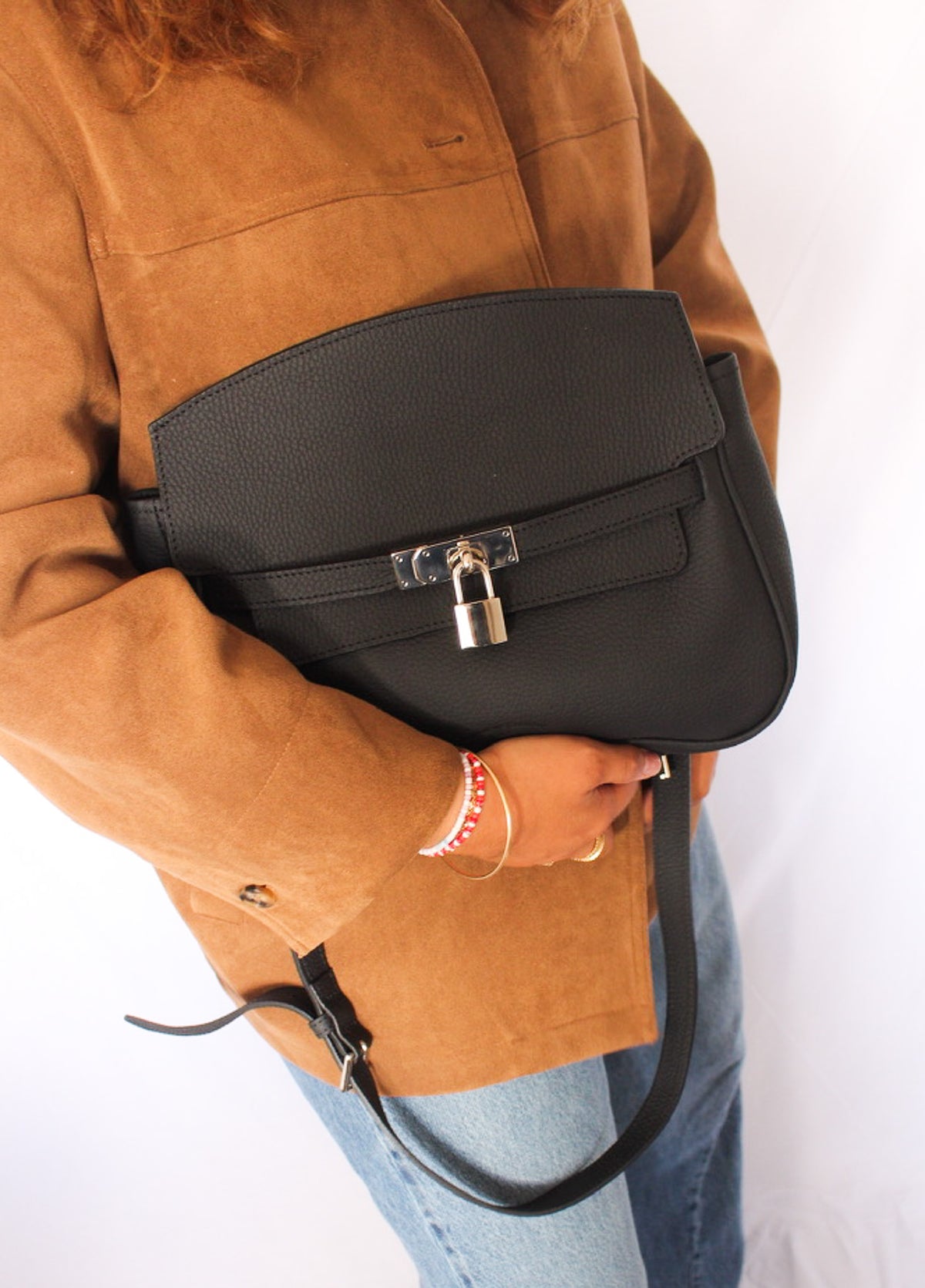 Grande pochette cuir grainé porté épaule